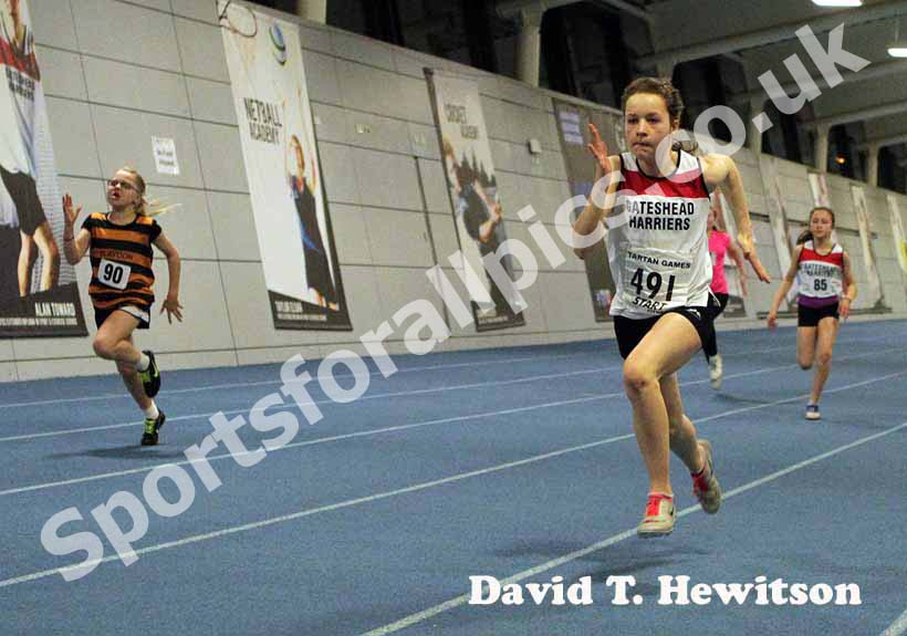Lauren Beales (Gateshead Harriers) winning the under-13 girls 60 metres.